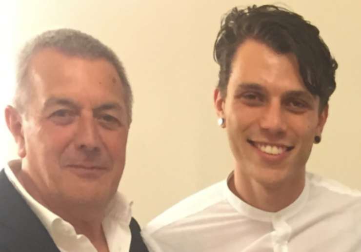 paudice con il padre in posa